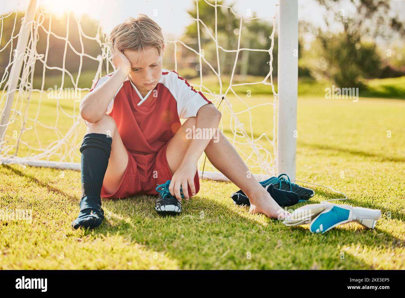 Boy unhappy football player hires stock photography and images Alamy