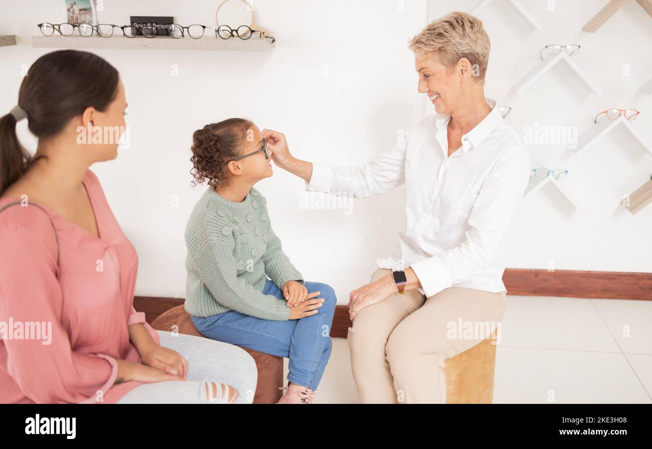 Mother, child and happy optometrist with glasses at after examine, eye …
