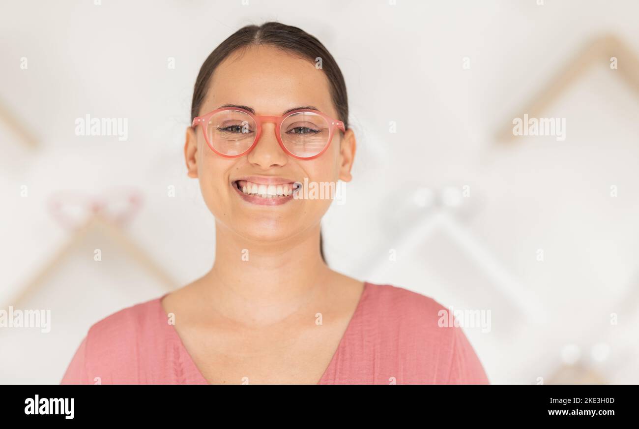 Face, glasses and vision with a woman at an optometrist for an eye test