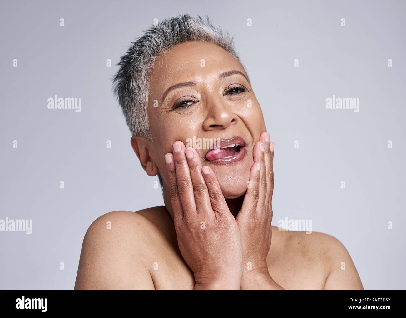 Beauty, senior and comic portrait of woman for cosmetic wellness, health and antiaging marketing. Funny, crazy and excited face of mature skincare Stock Photo