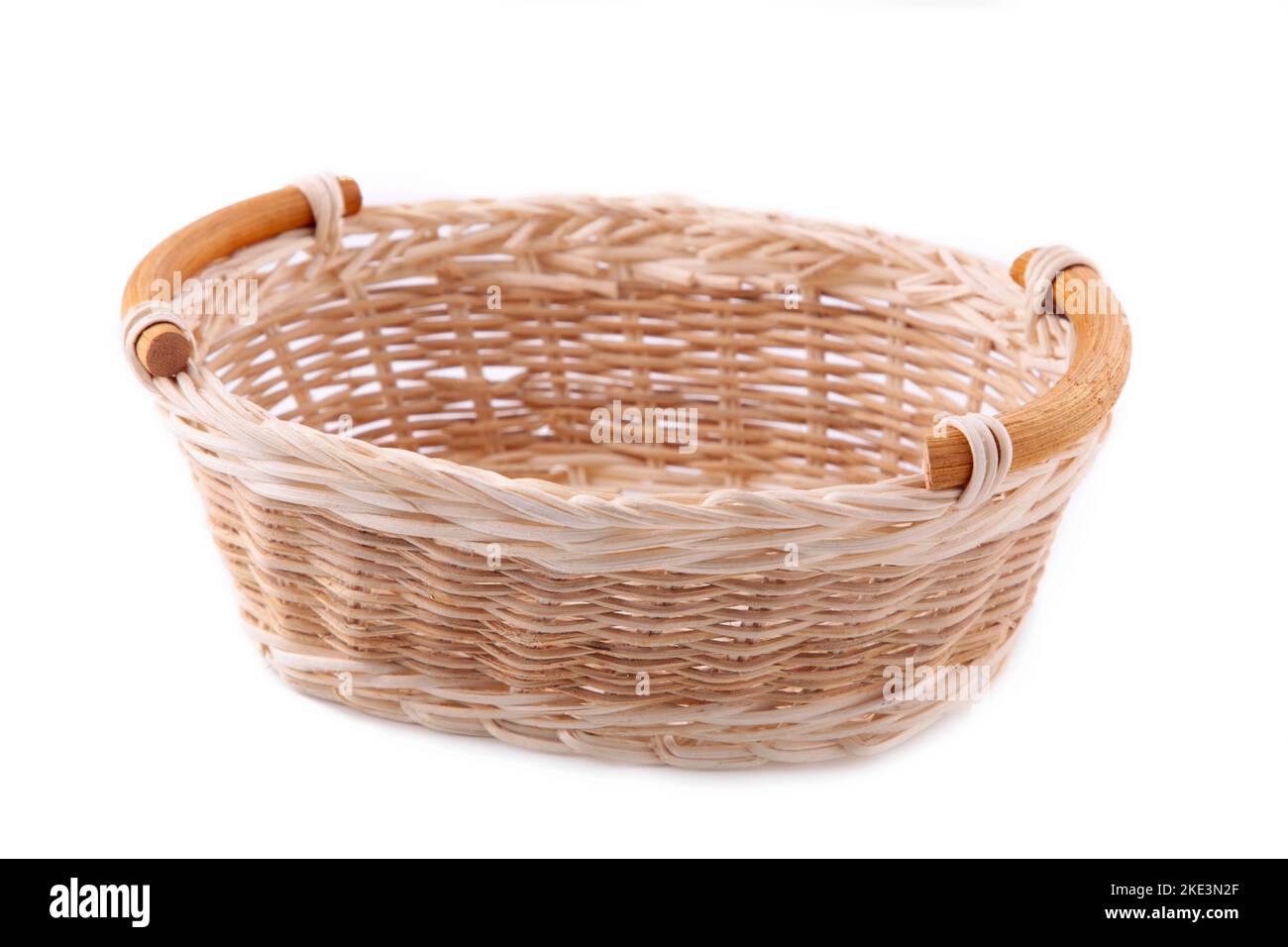 Empty wicker basket isolated on white background Stock Photo - Alamy