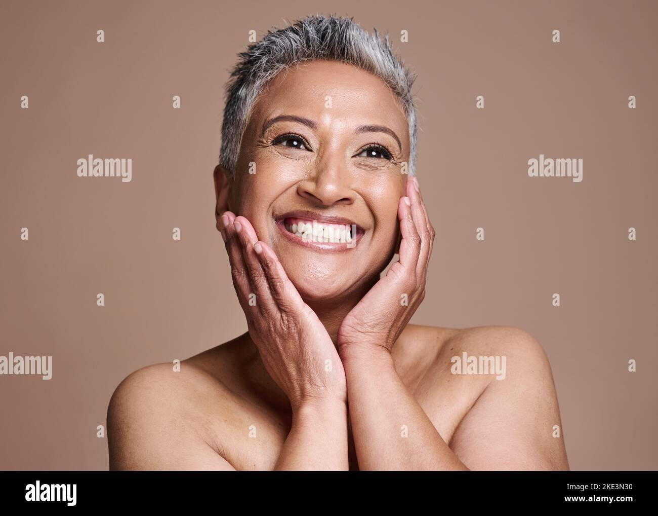 Skincare, anti aging and portrait of mature woman with smile on her face on studio background. Beauty, botox and collagen, happy middle aged lady from Stock Photo