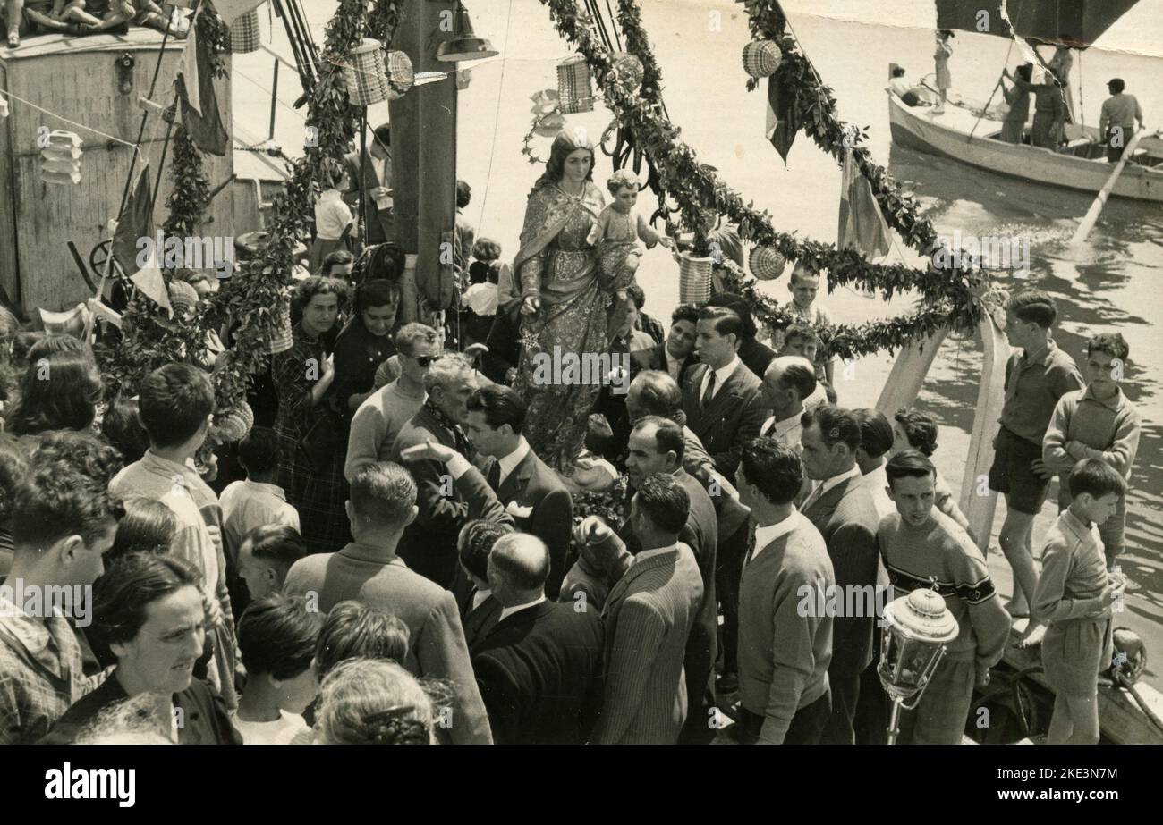Feast of the Madonna of the see with procession on the boat, Italy 1950s Stock Photo