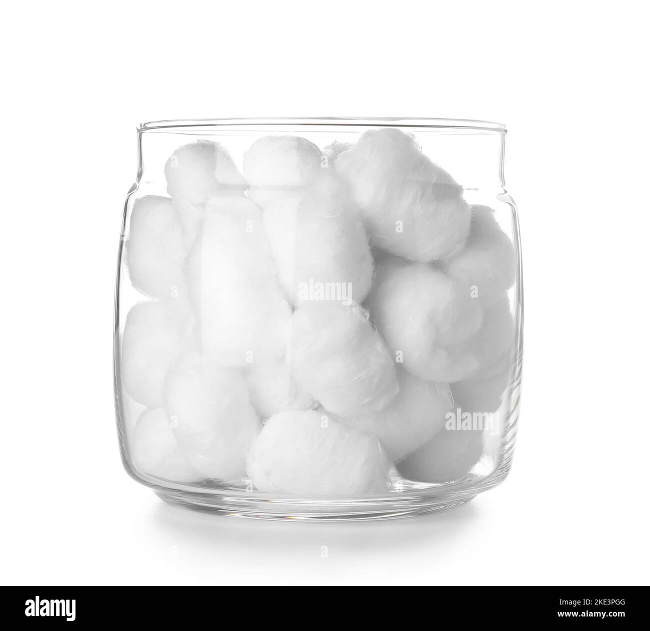 Glass jar of cotton balls on white background Stock Photo Alamy