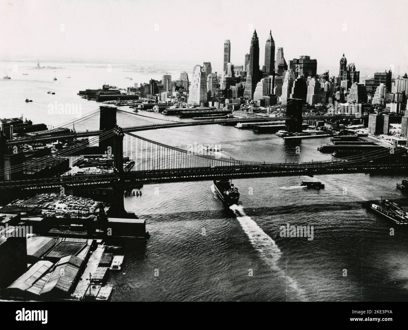 Aerial view of the East River and Manhattan and Brooklyn Bridges, New 