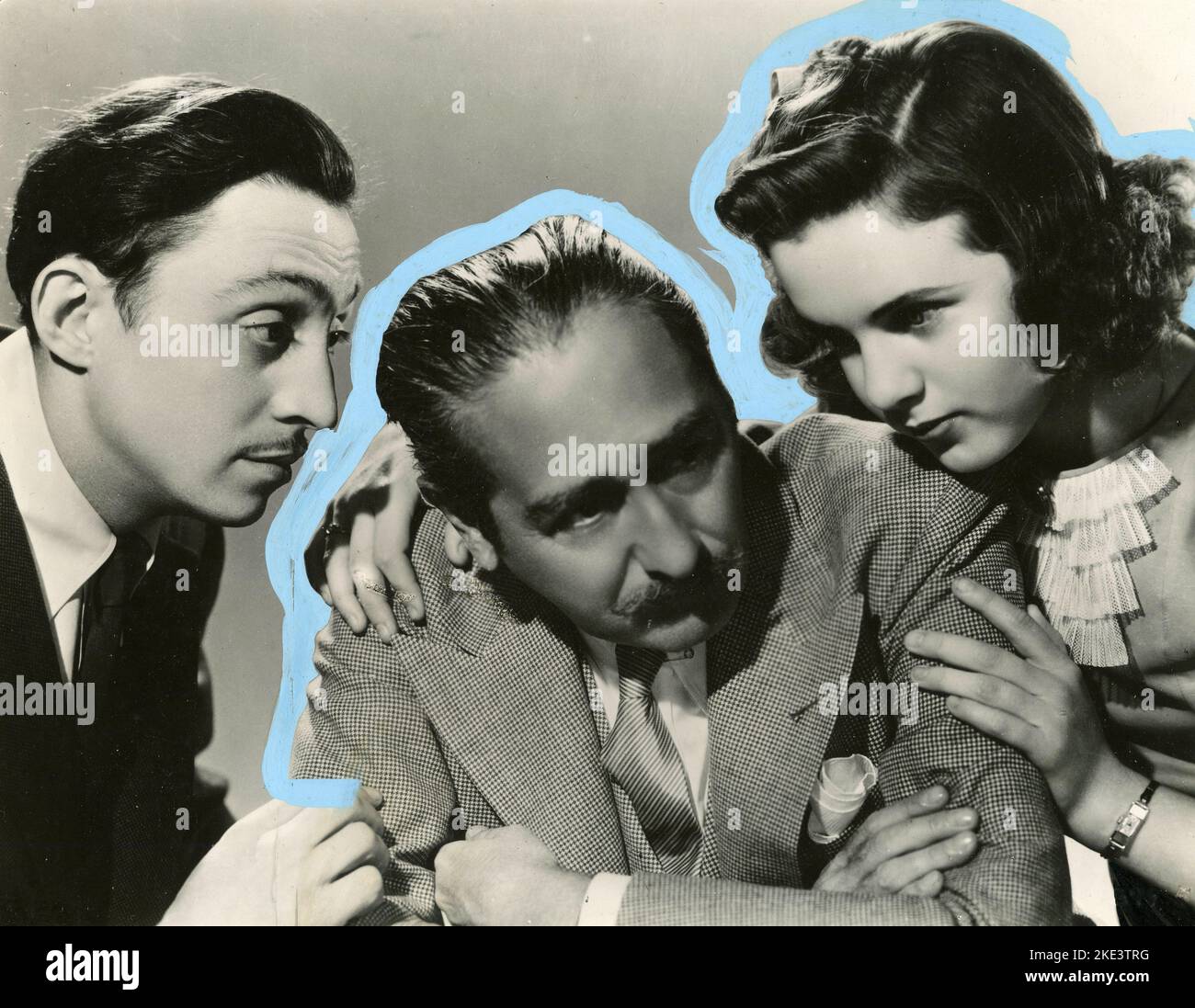 From left: Misha Auer, Adolphe Menjou and Deanna Durbin in the movie One Hundred Men and a Girl, USA 1937 Stock Photo