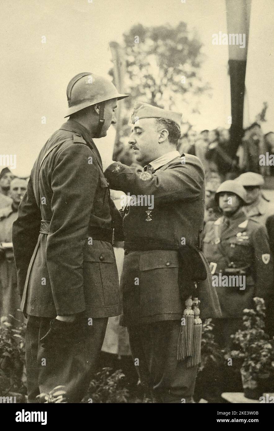 Spanish general, politician and Caudillo Francisco Franco giving medals to soldiers, Spain 1939 Stock Photo