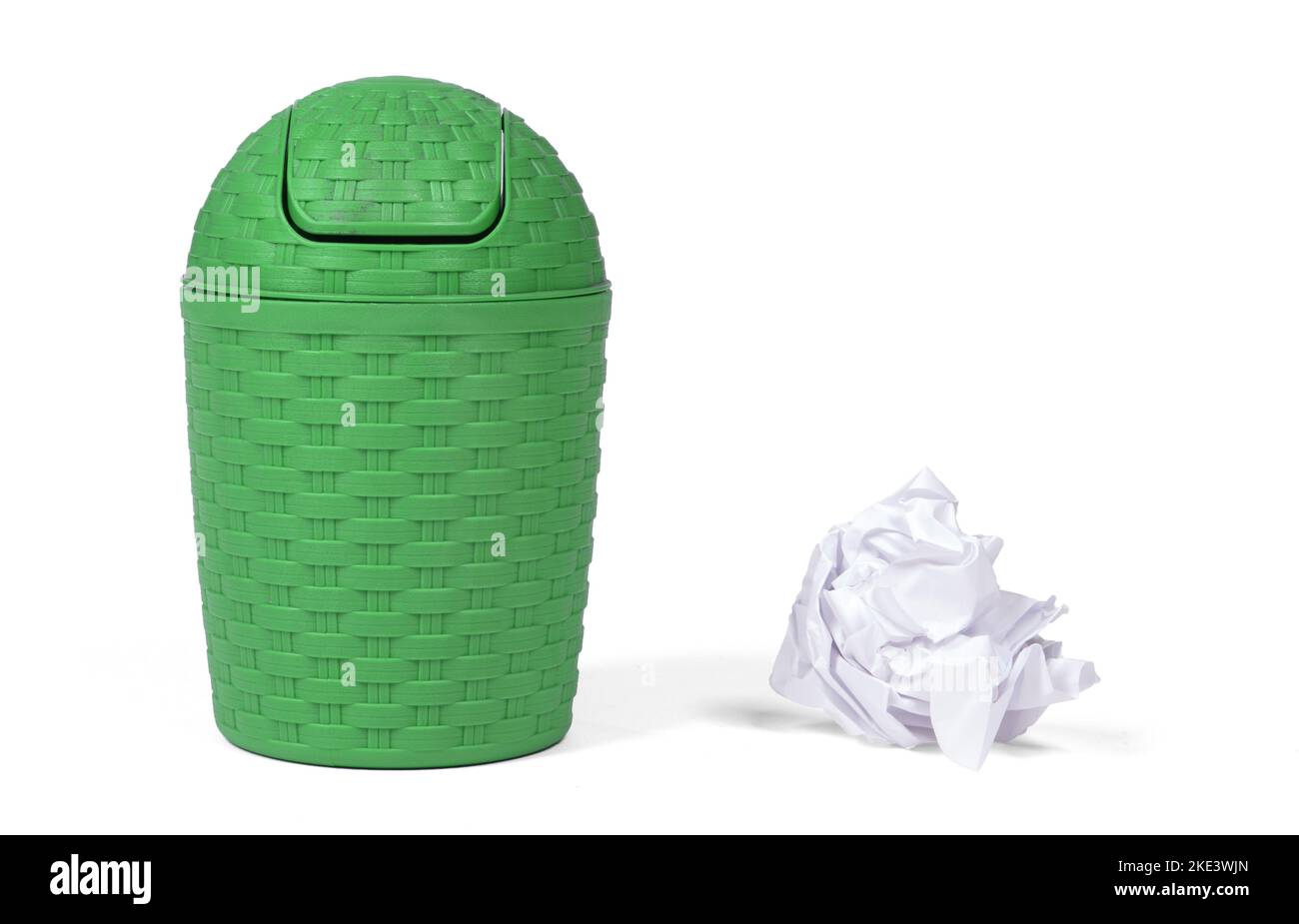 Small green plastic bin isolated on white background Stock Photo - Alamy