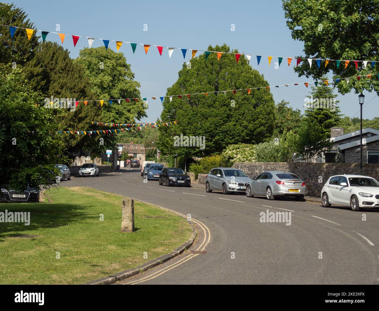 Street view in summer in the pretty Peak District village of Ashford In