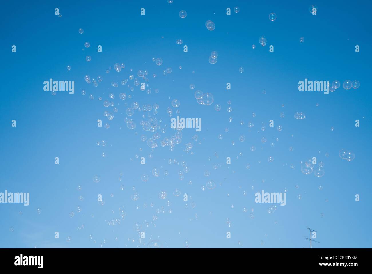 soap bubbles in the air with blue sky Stock Photo - Alamy