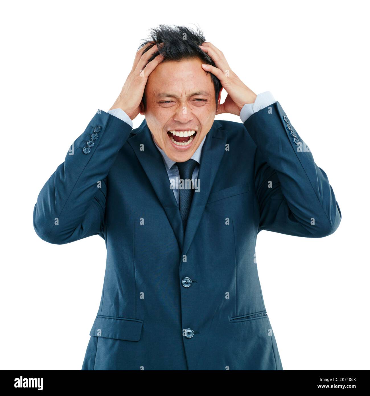 My brain is fried right now. Studio shot of a handsome young businessman posing against a white