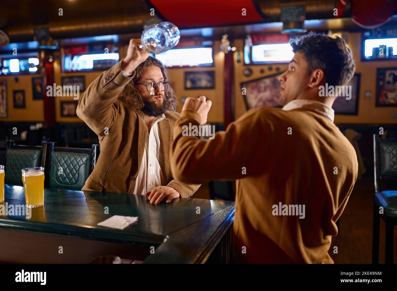 Unhappy Furious Men Fighting At Pub Stock Photo Alamy