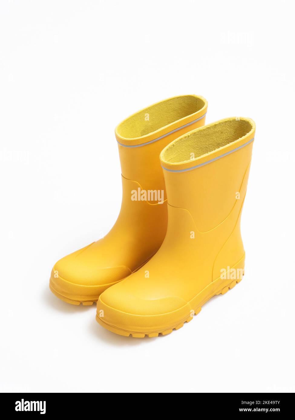 Yellow rubber boots isolated on white Stock Photo Alamy