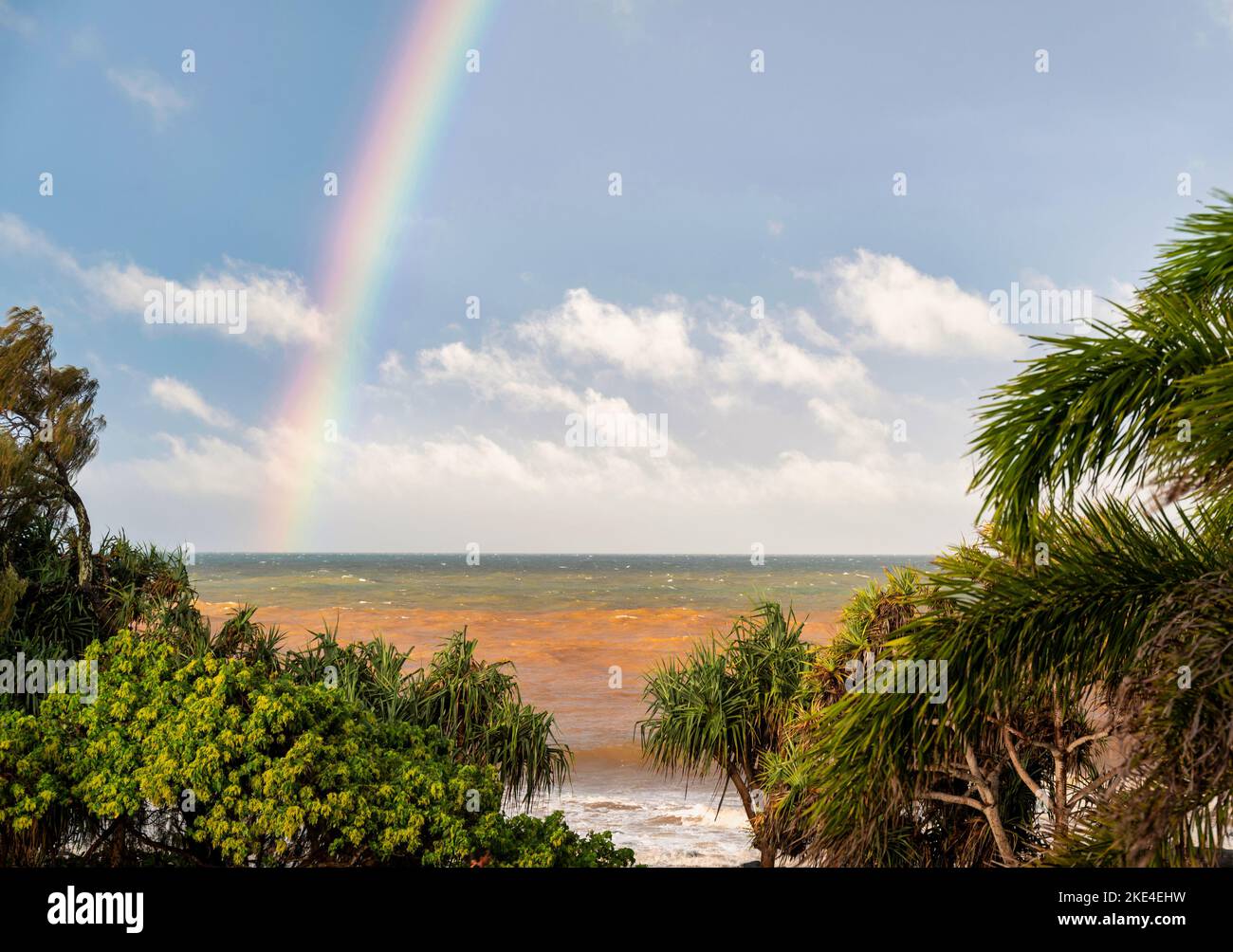 Rainbow clouds rain sun blue sky hi-res stock photography and images ...