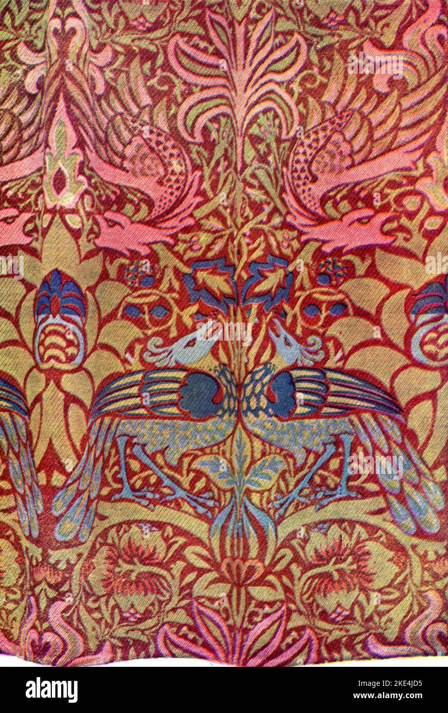 'Peacock & Dragon', 1878. Wool fabric designed by William Morris. Produced by Morris & Co. William Morris (1834-1896), was an English textile designer, artist and writer. The prominent socialist was closely associated with the Pre-Raphaelite Brotherhood and English Arts and Crafts Movement. Stock Photo