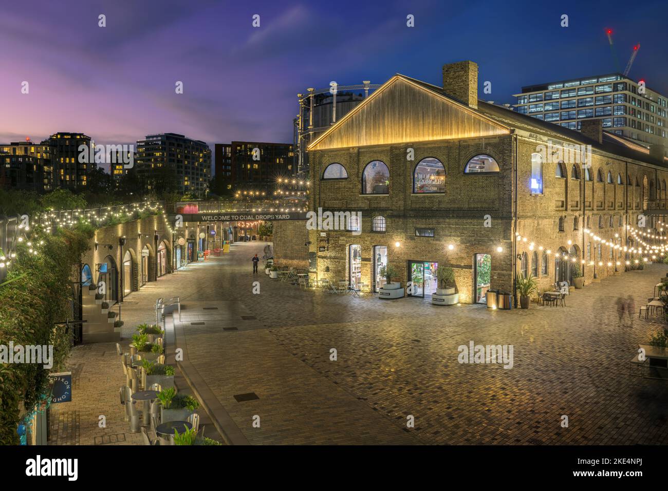 Coal Drops Yard, on the Regent's Canal at Kings Cross in London, taken at dusk on a November evening. Stock Photo