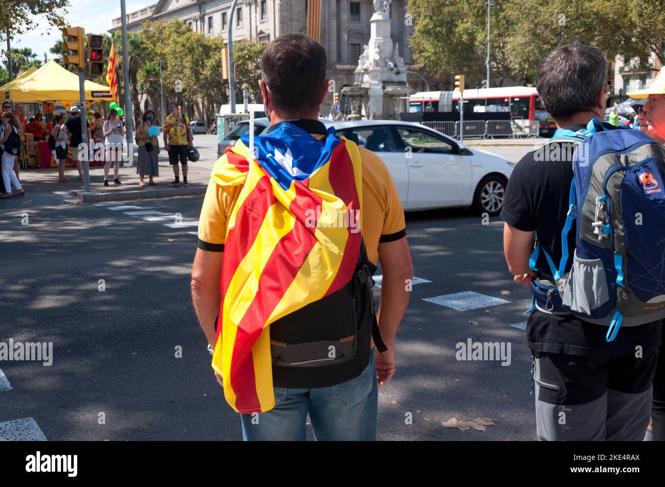 11 September 2020, Man with the separatist catalan flag wearing the estelada, as a cape, Diada, catalan festivity in Barcelona, Catalonia, Spain Stock Photo