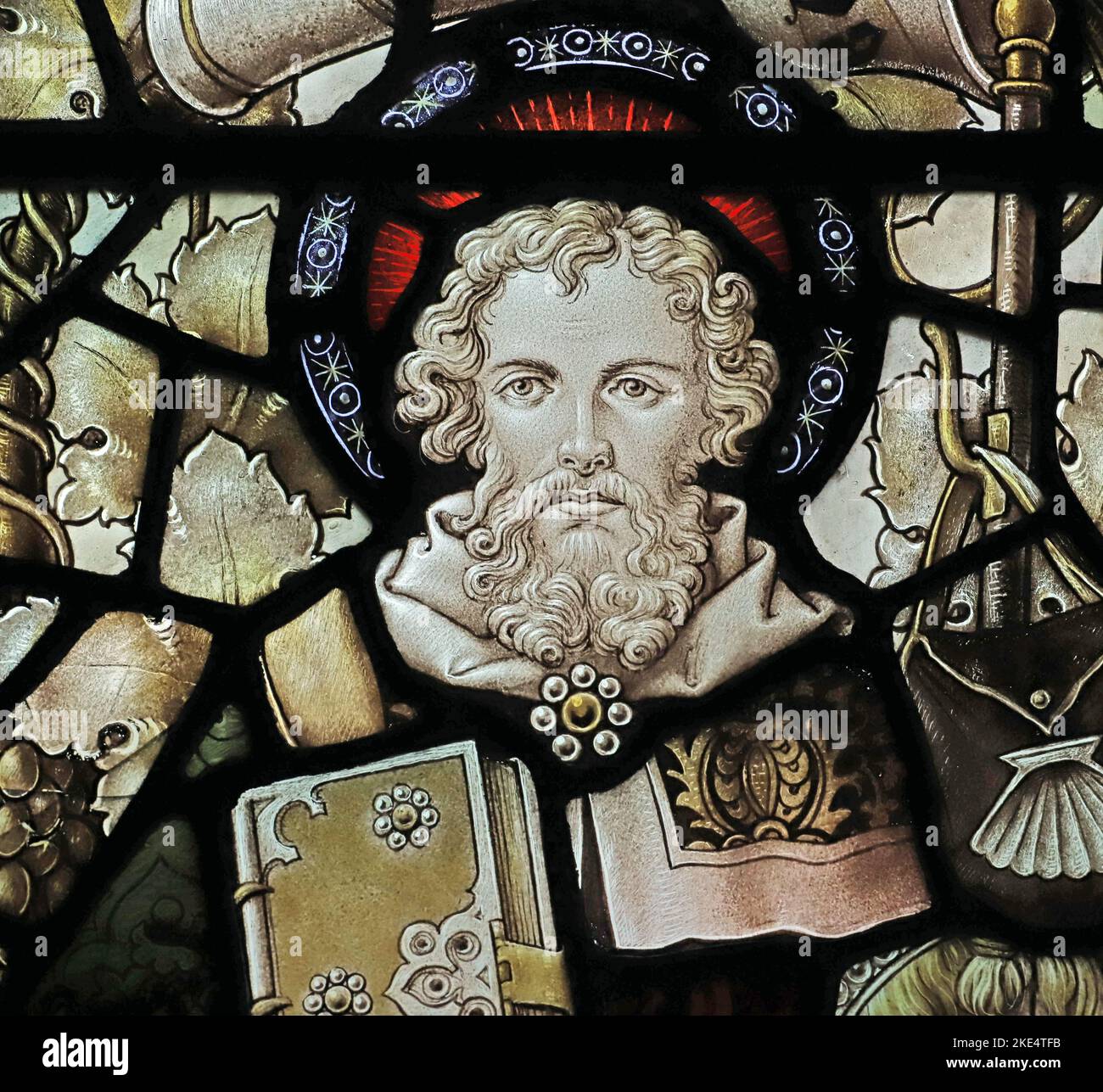 Stained glass window by Percy Bacon & Brothers depicting St James the Great, St Barnabas Church, Emmer Green, Reading, Berkshire Stock Photo