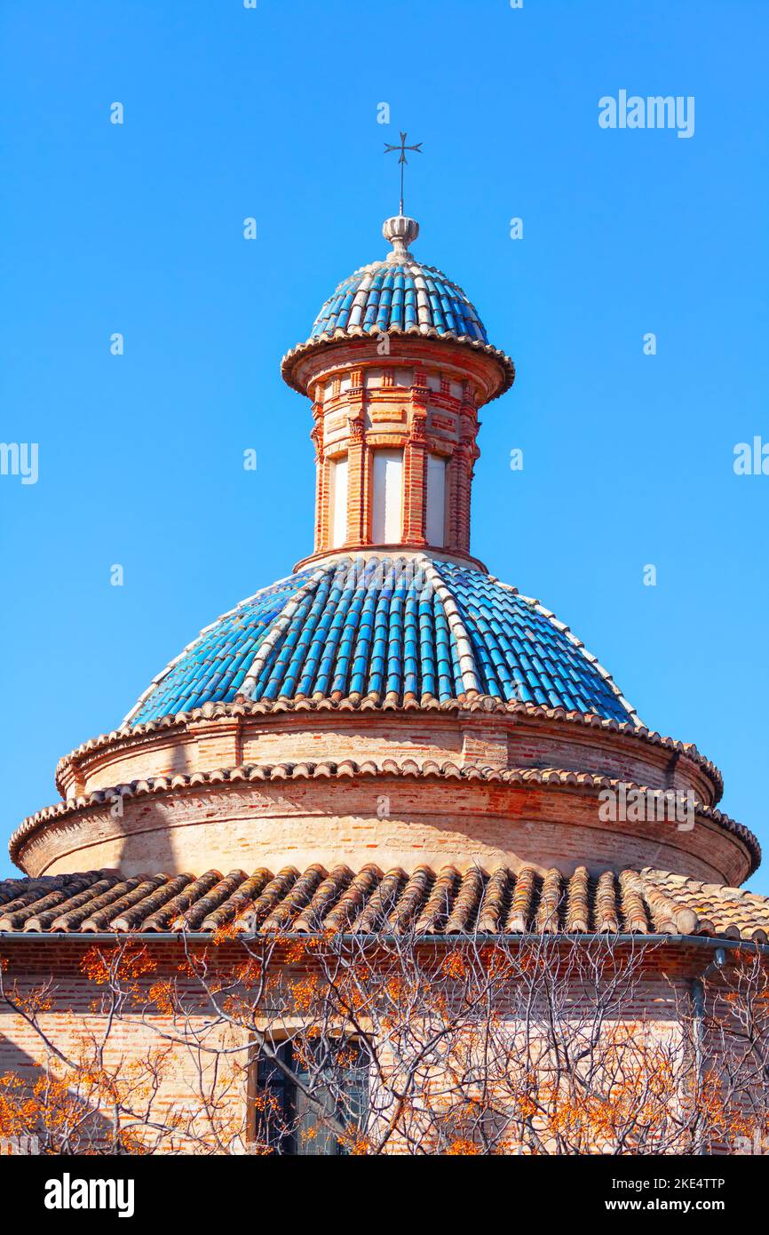Blue roof tile cupola . Steeple with cross on the top Stock Photo Alamy