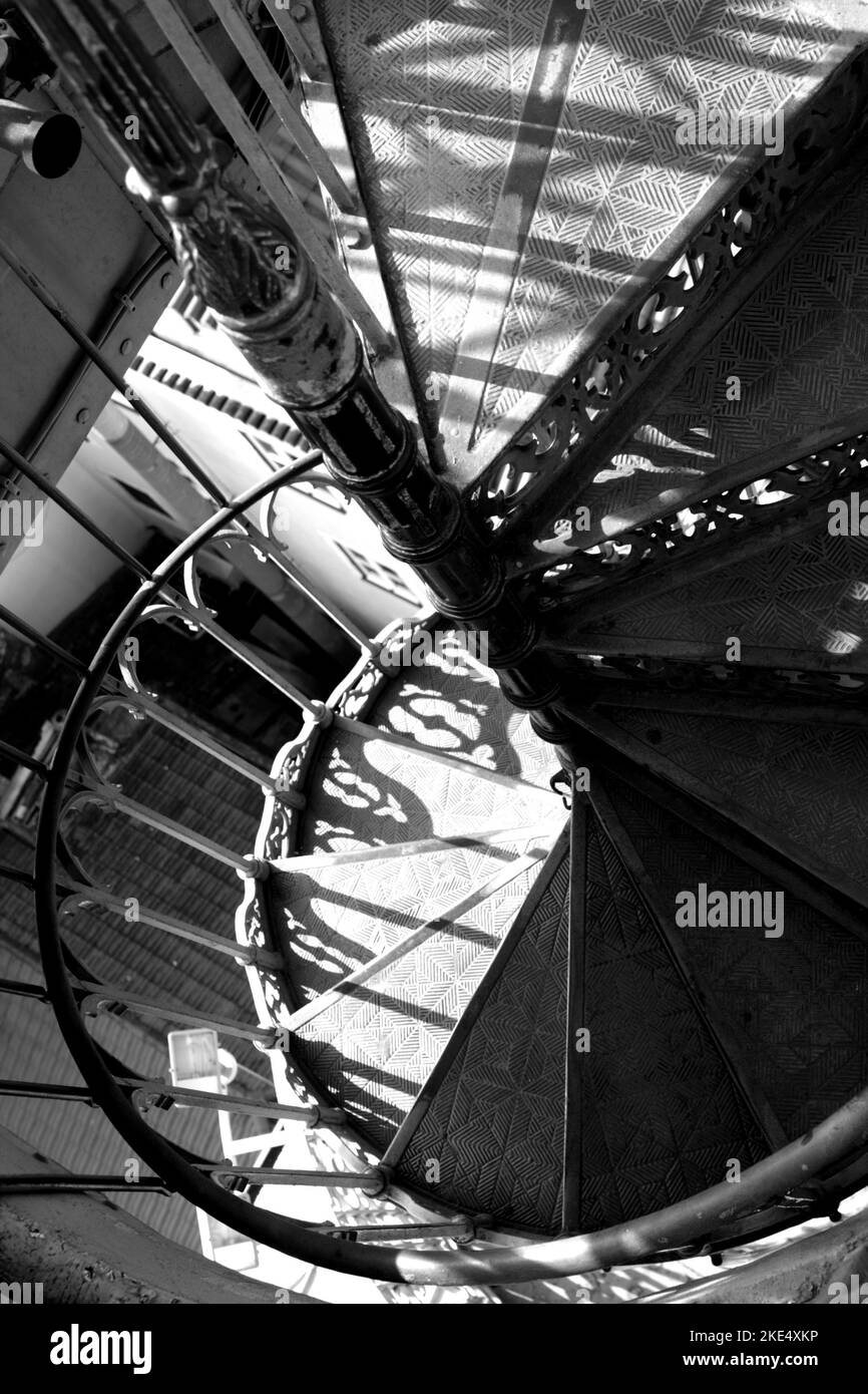 Black and white image of the spiral staircase on the Elevador de Santa Justa, Santa Justa Lift, Lisbon, Portugal Stock Photo