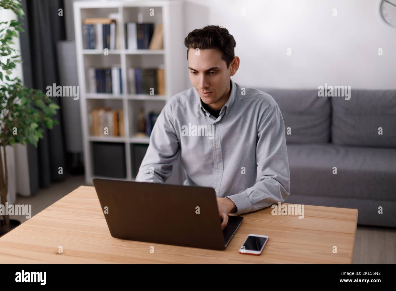 Man working on laptop Stock Photo
