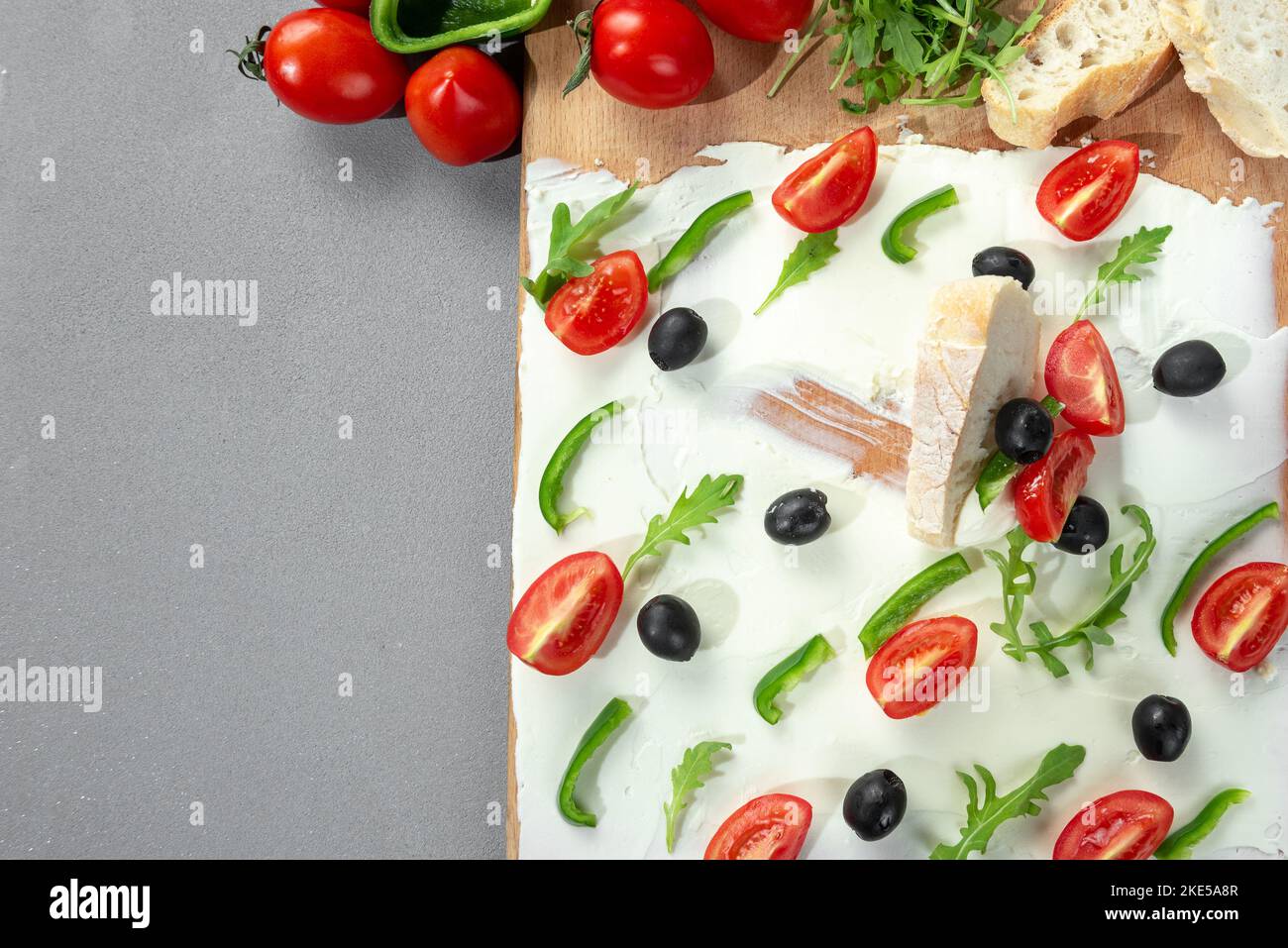 A food trend, bread with butter and toppings. Board with butter snack