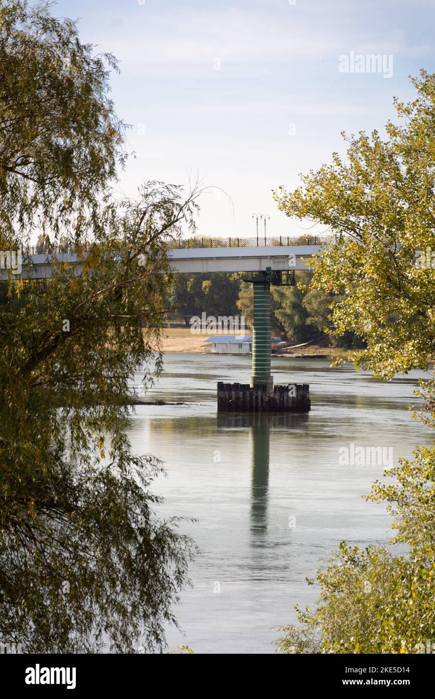 Bridge over the Dniester river. Bridge support. Autumn cityscape, selective focus Stock Photo