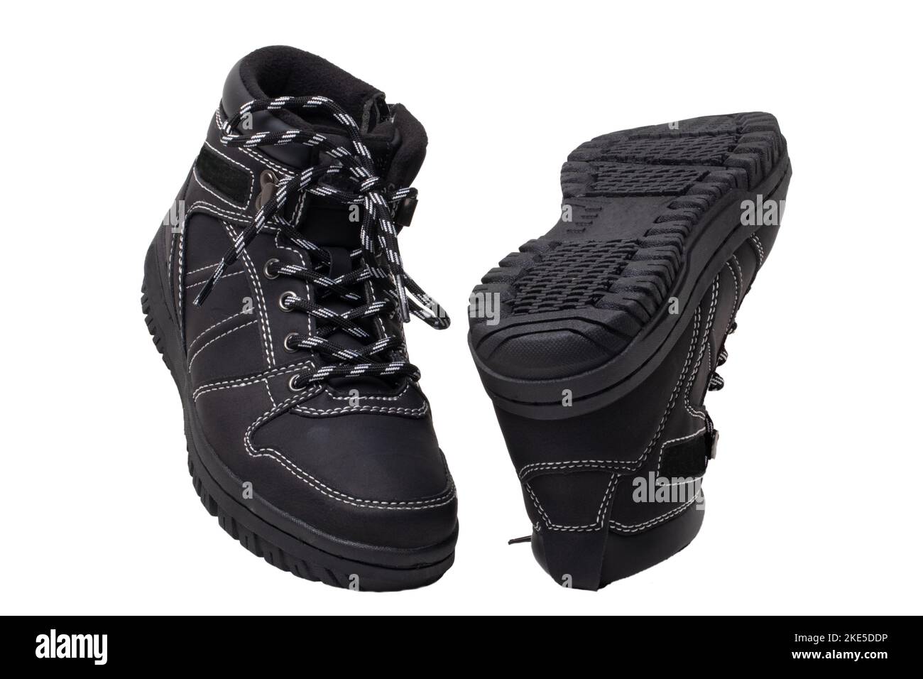 Winter boots. Closeup of a pair elegant black leather winter boots