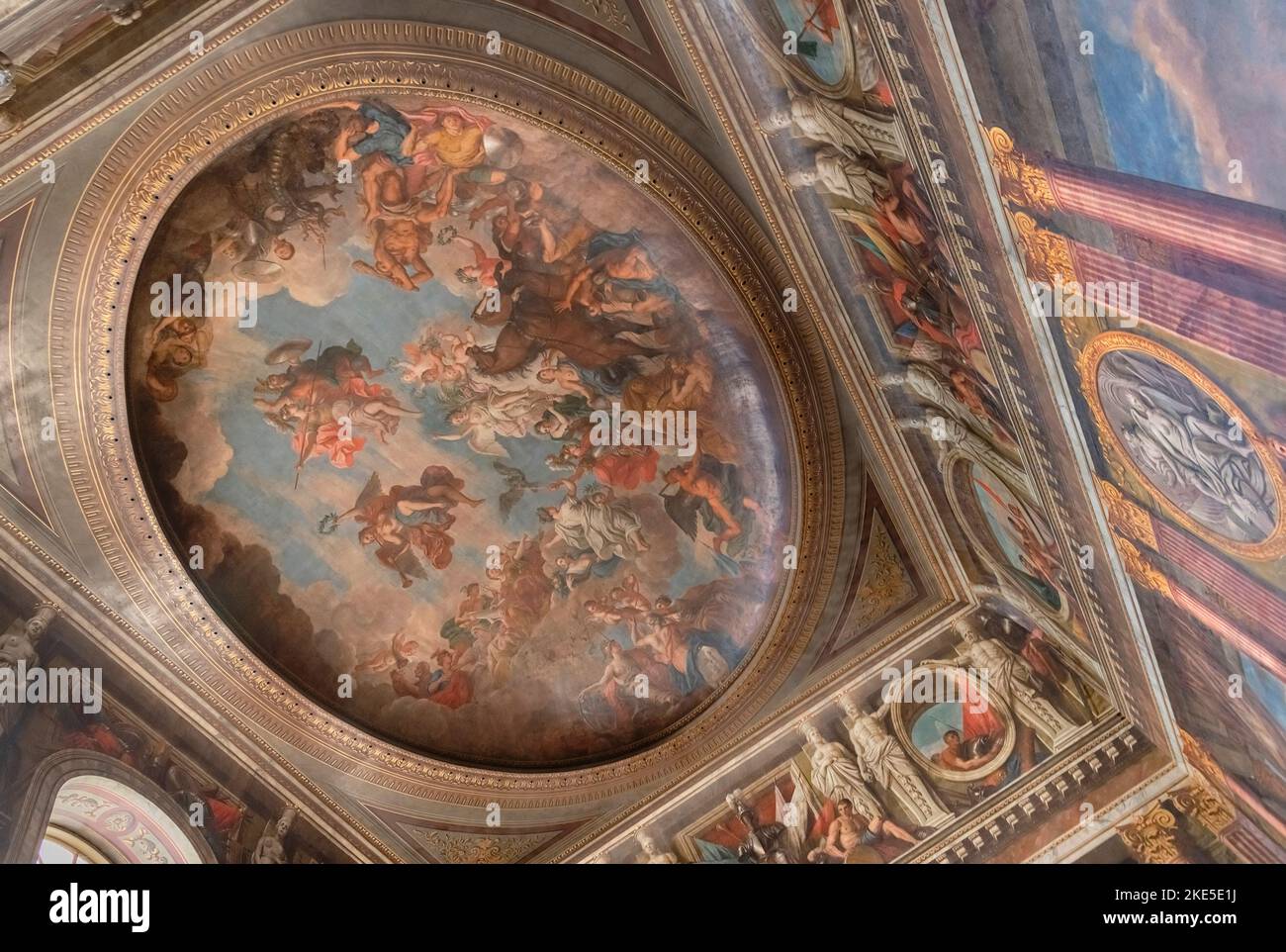 England, Oxfordshire, Woodstock, Blenheim Palace, the ceiling of what was formerly called The Saloon now known as the State Dining Room featuring walls and ceilings painted by French decorative artist Louis Laguerre. Stock Photo