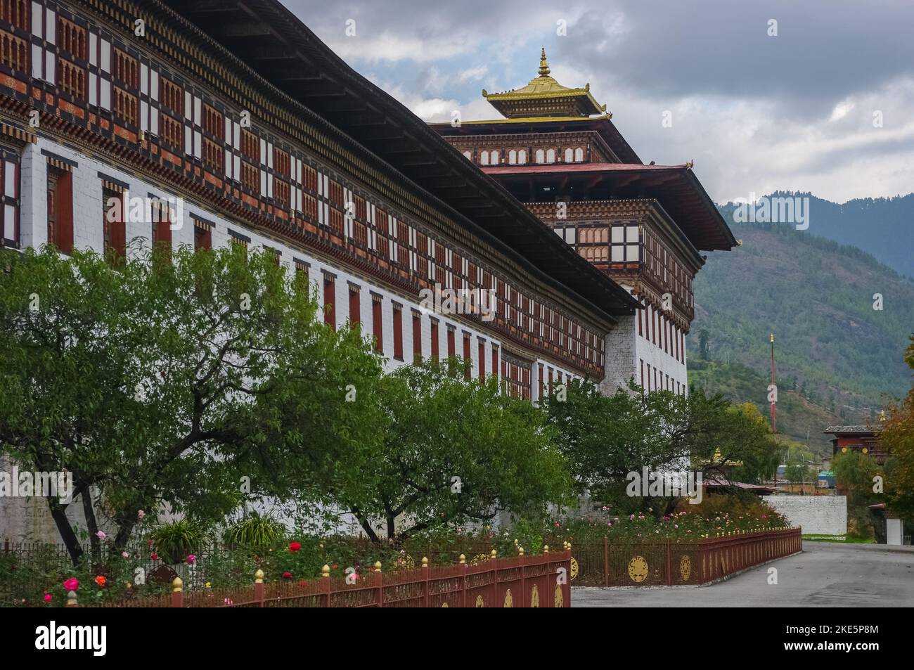 Landscape side view of Tashichho dzong, fortress, monastery and seat of the government in Thimphu, capital city of Bhutan Stock Photo