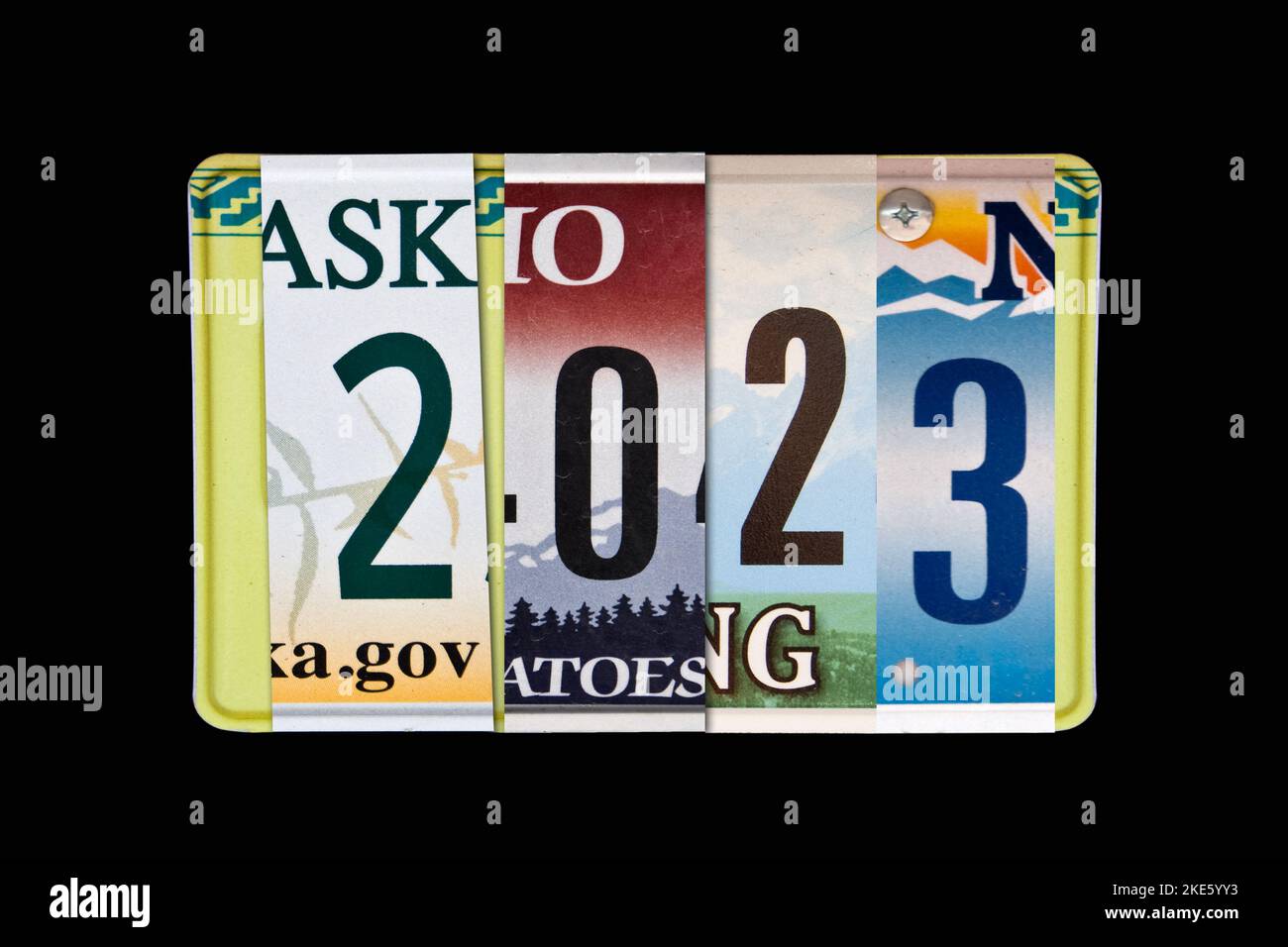 2023 writtten with US licence plates, black slate background Stock Photo