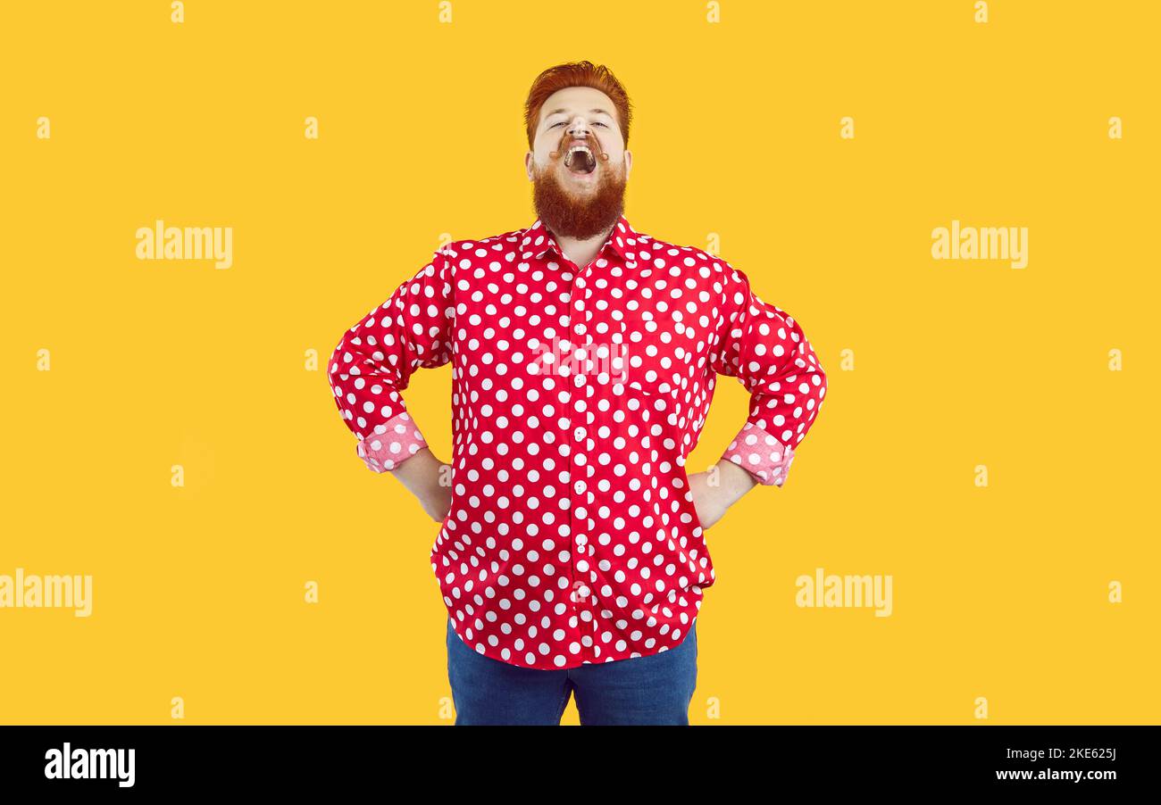 Funny redhead man make loud announcement Stock Photo