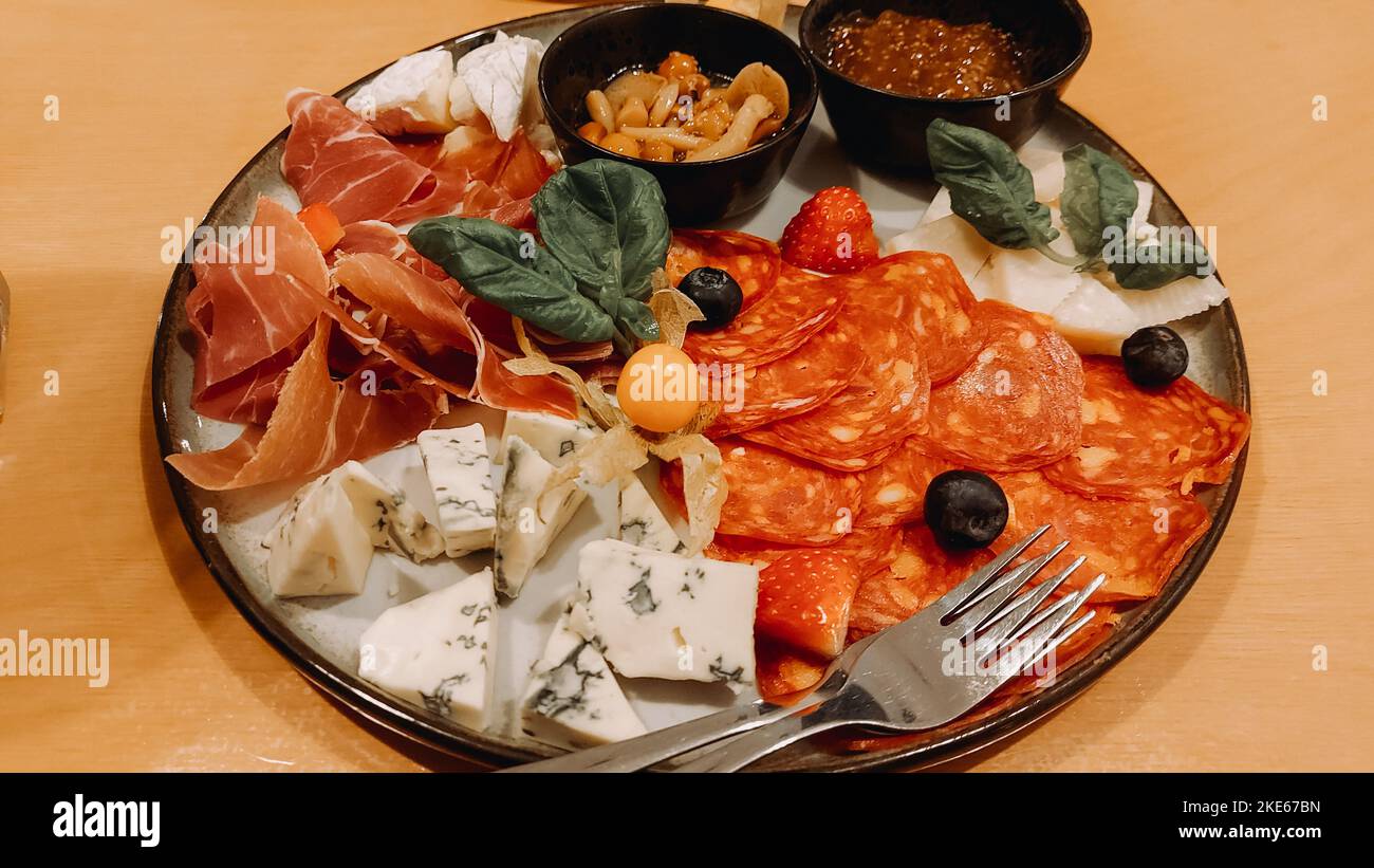 Italian salami meat platter prosciutto ham, bresaola, pancetta