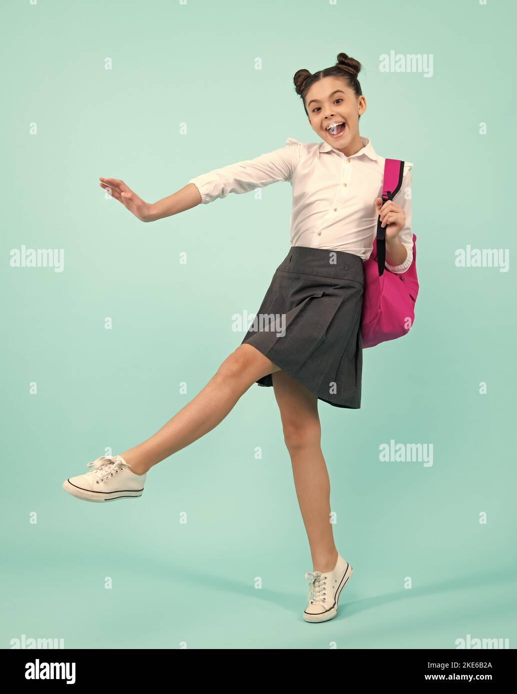 Back to school. Teenager schoolgirl in school uniform with backpack ...