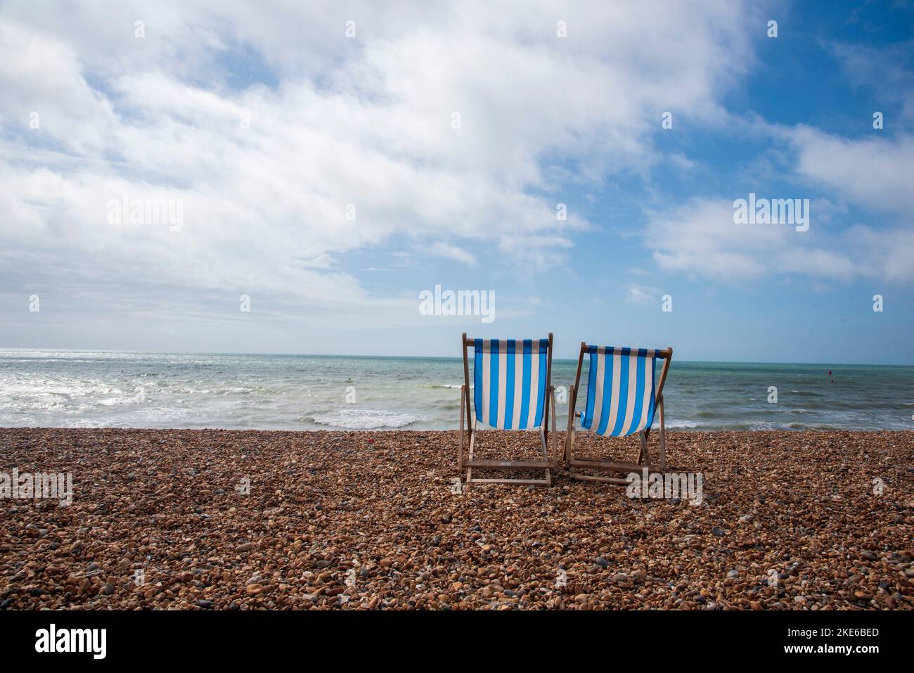 Deck Chairs on the Beach in Brighton Stock Photo - Alamy