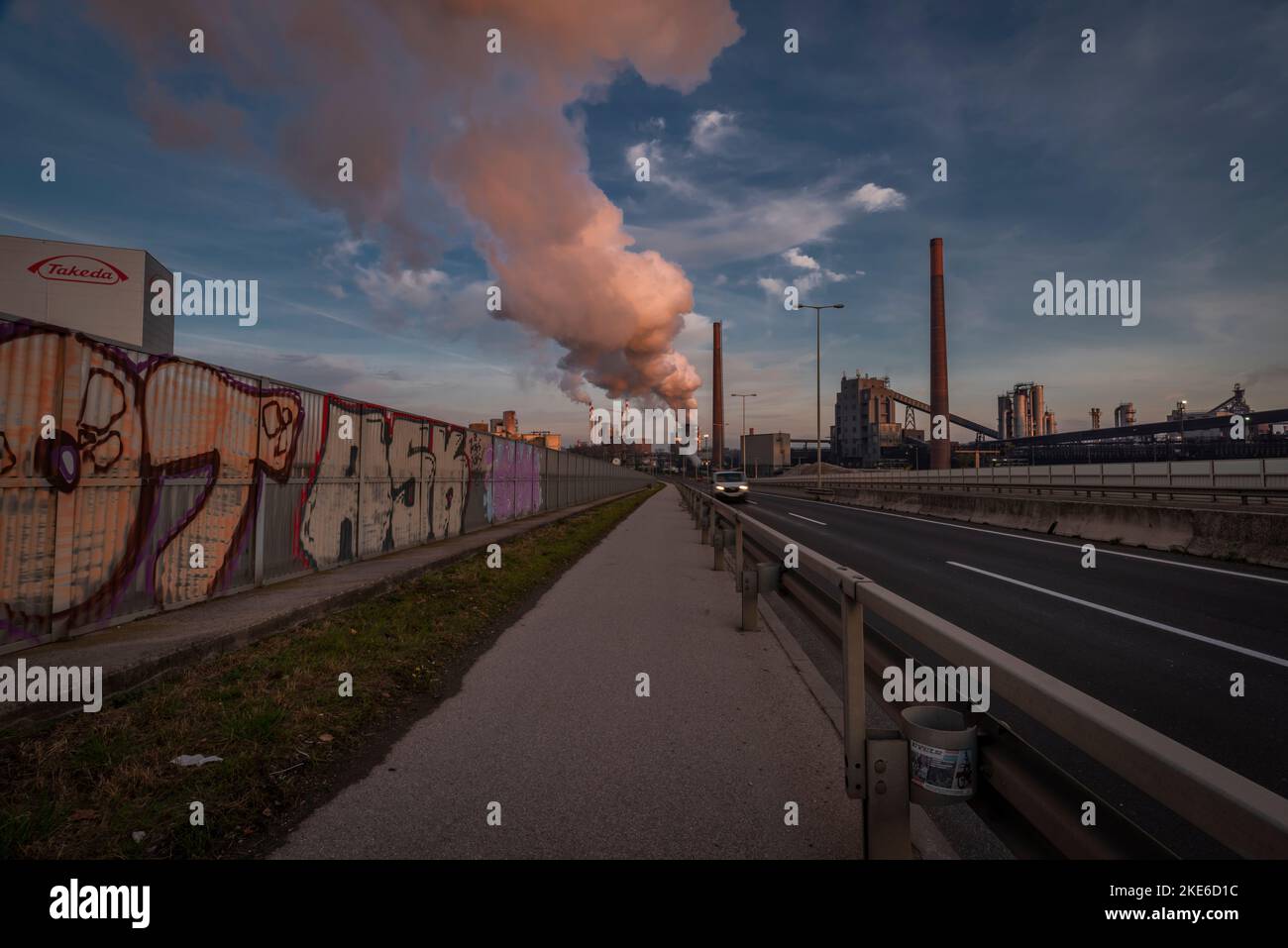 Chemistry factories in Linz city in color sunny dirty evening Stock Photo