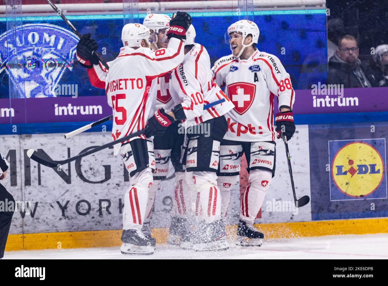 TURKU, FINLAND NOVEMBER 10 Roger Karrer of Switzerland (M) celebrates his goal with teammates