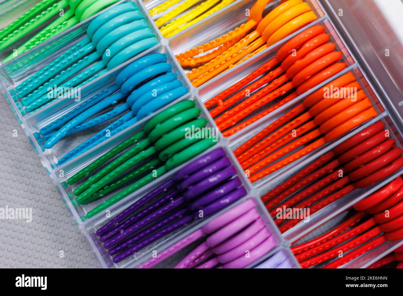 A set of colored elastic bands for installing braces in orthodontic dental treatment Stock Photo