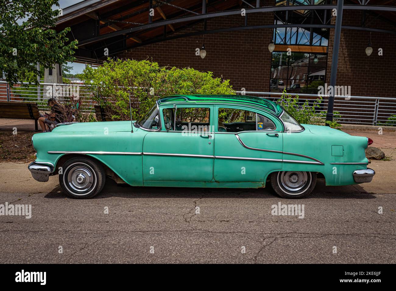 Des Moines, IA - July 02, 2022: High perspective side view of a 1955 Oldsmobile 88 4 Door Sedan at a local car show. Stock Photo
