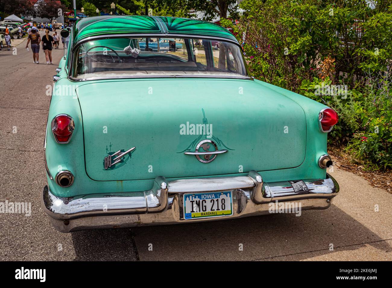 Des Moines, IA - July 02, 2022: High perspective rear view of a 1955 Oldsmobile 88 4 Door Sedan at a local car show. Stock Photo