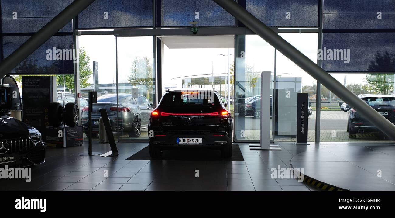 Wietmarschen, Germany - Nov 9 2022 Car being driven out of a showroom. It's a all electric Mercedes Benz EQA 250+ Stock Photo