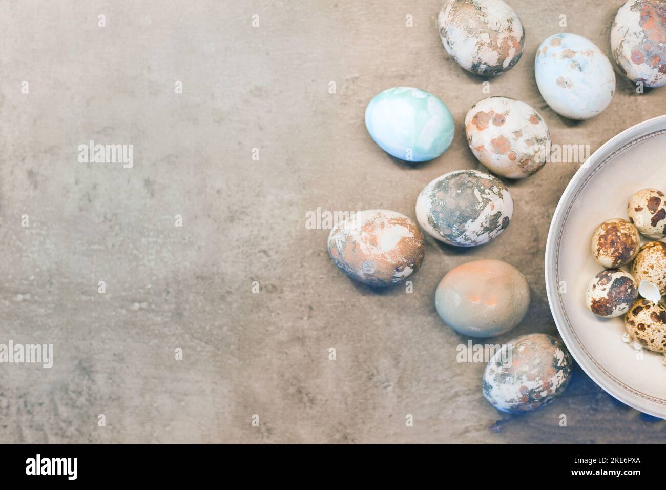 blue easter eggs on concrete. Happy Easter card: marble stone effect painted. top view, flat lay Stock Photo