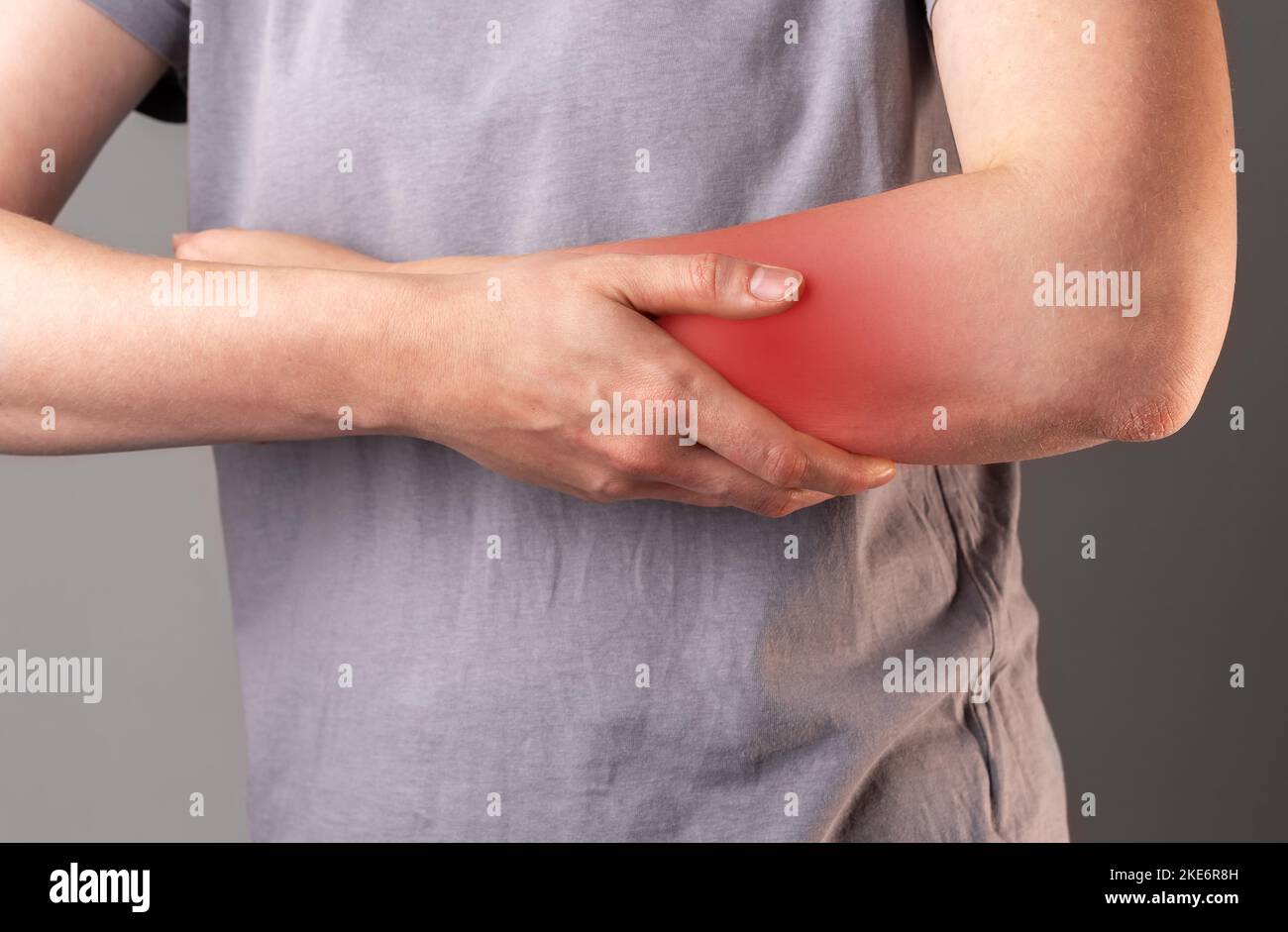 Hand pain closeup. Contusion, trauma of arm, massaging it closeup. High quality photo Stock Photo