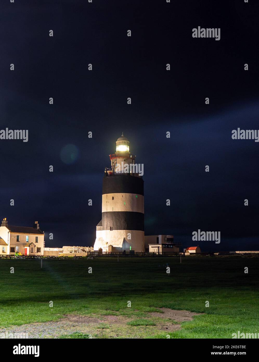 Hook Lighthouse at night. One of the oldest lighthouses in the world. Stock Photo