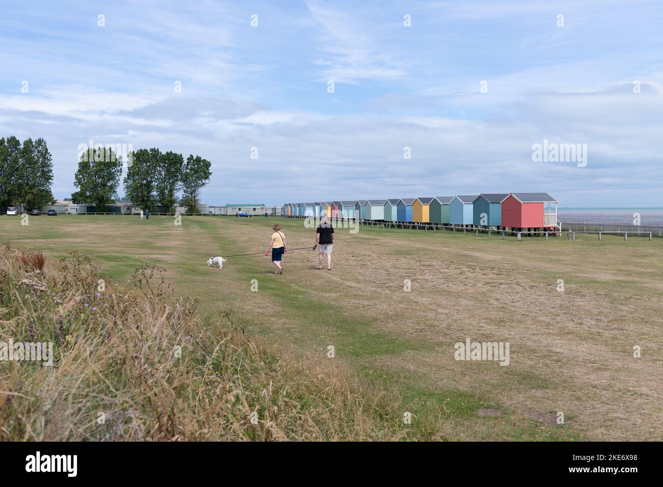 Leysdown beach huts and Shellness beach car park, Leysdown on Sea, Isle of Sheppey, Kent, England, UK Stock Photo