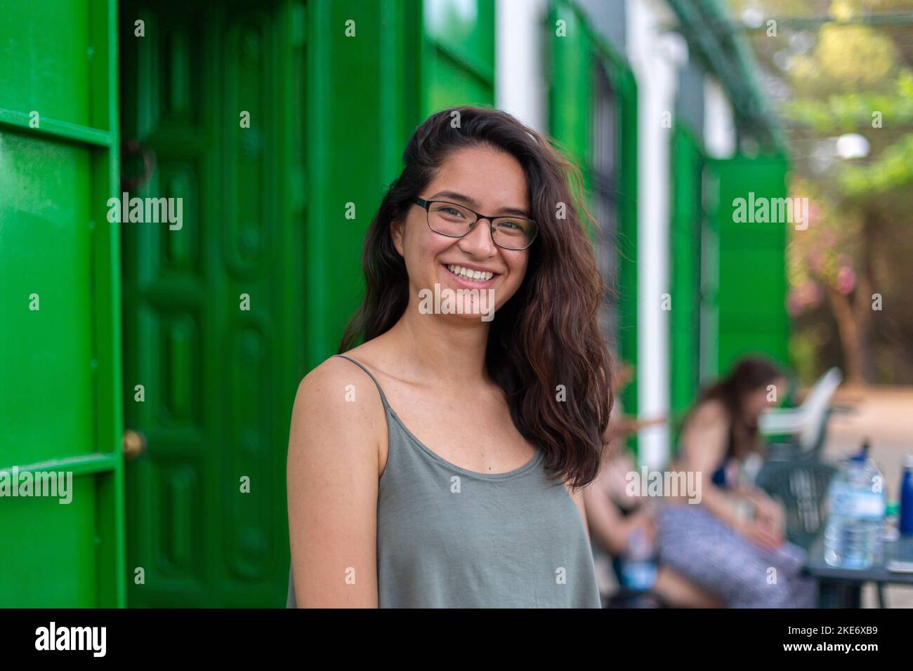 Young woman wearing glasses at a party Stock Photo