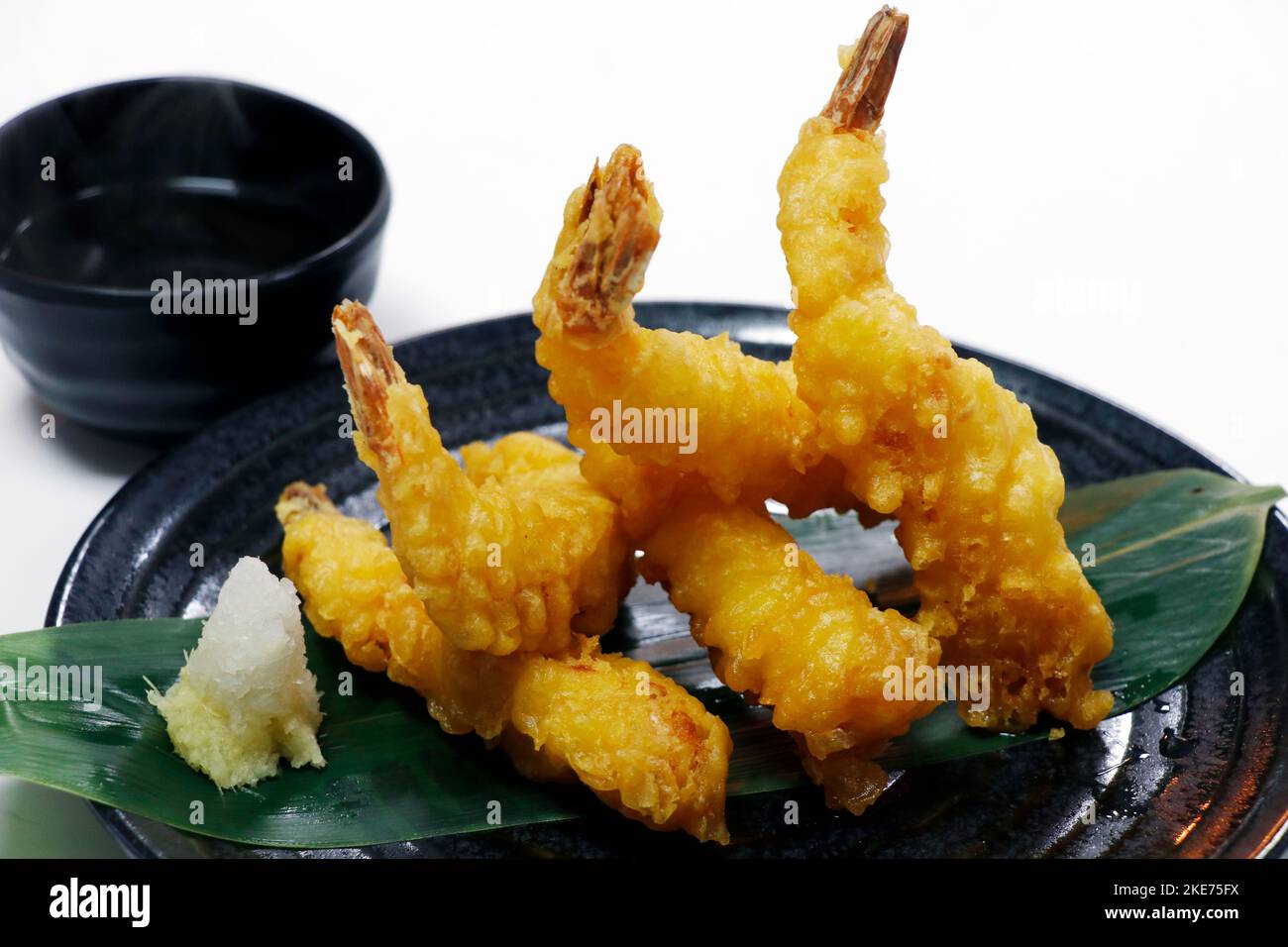 tempura battered crispy fried shrimps or prawns with white background