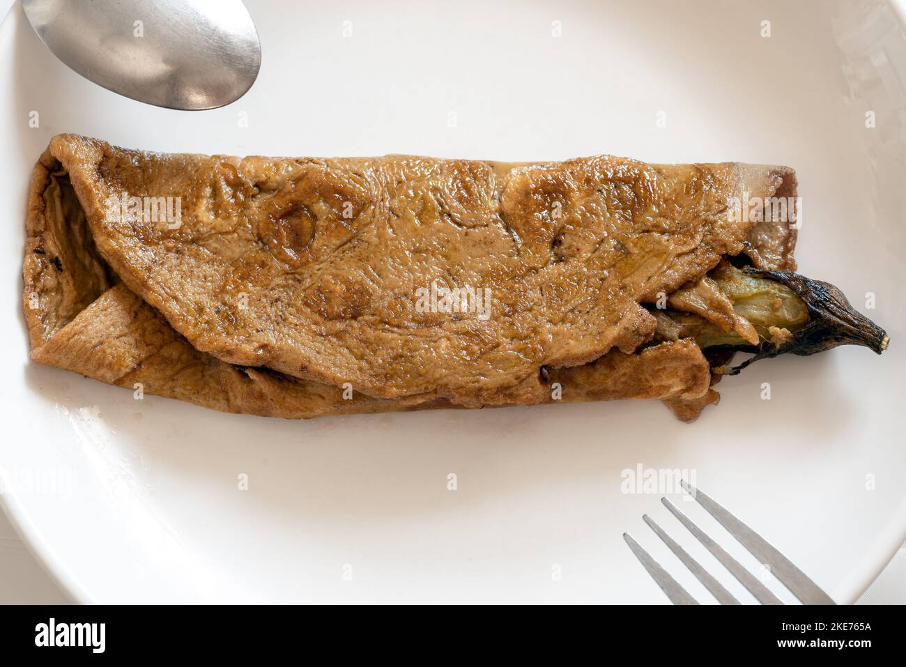 Tortang talong is an eggplant omelette Filipino dish and is a popuar