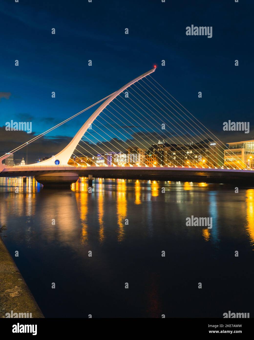 A Vertical Shot Of The Samuel Beckett Bridge In Dublin Ireland At Night A Vertical Shot Of The Samuel Beckett Bridge In Dublin Ireland At Night