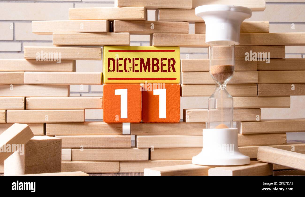 December 11th. Image 11 day of december month, calendar on yellow background with empty space